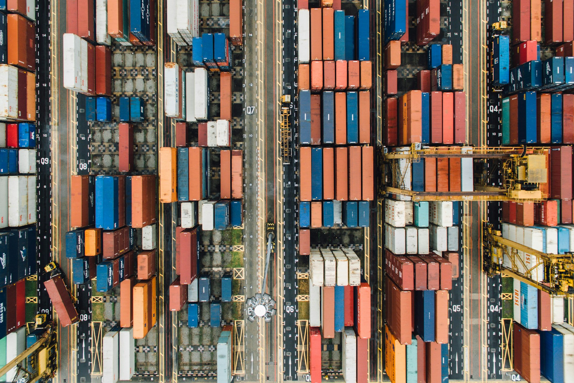 geotab-go-anywhere-track-container A Geotab GO Anywhere Asset Tracker installed on a container in port, displaying its compact design and rugged build suitable for outdoor environments. Help find them anywhere.